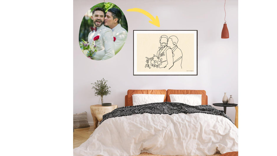 Custom printed line art of a gay couple on the wall over a bed.