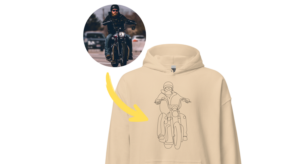 Custom embroidered hoodie with line art of a man riding his motorcycle. The hoodie is beige and the man is wearing black sunglasses, black leather jacket, and a black helmet.