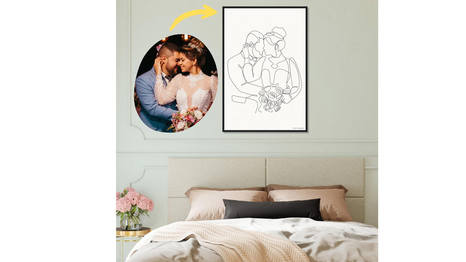 Custom printed line art of a couple on the wall over a bed.